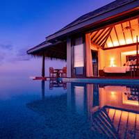 Sunset Over Water Pool Villa