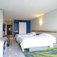 Queen Room with Two Queen Beds and Beach View