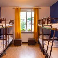 Bed in 12-Person Room with shared bathroom