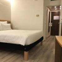 Standard Room with One Queen Bed and One Sofa Bed