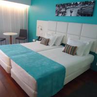 Twin Room (1 Adult + 1 Child)