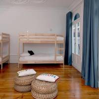 Bed in 8-Bed Dormitory Room with Balcony