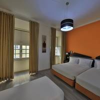 Quadruple Room with Private Bathroom