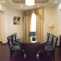 Royal Suite with King Bed and Two Double Beds