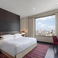 One-Bedroom Suite with a King Bed or Two Single Beds and City View
