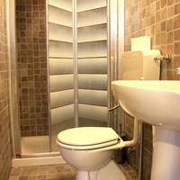 Quadruple Room with Private Bathroom