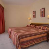 One-Bedroom Apartment (2 Adults + 2 Children)