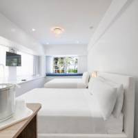 Corner Queen Room with Two Queen Beds and Ocean View