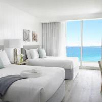 Two Bedroom Partial Ocean Suite (Queen- 2 Double)