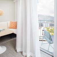 Corner Suite, 1 King Bed, Twin Day Bed, Double Balcony