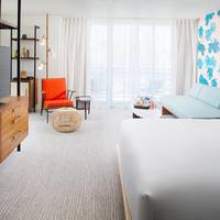 Corner Suite, 1 King Bed, Queen Day Bed, Twin Day Bed, Double Balcony 