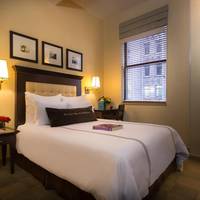 Petite Room with One Full Bed