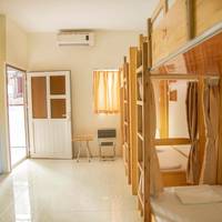 Bed in 4-Bed Dormitory Room with Balcony