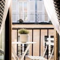 Queen Room with Balcony and Paris Rooftops View