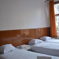 Standard Quadruple Room with Private Bathroom 