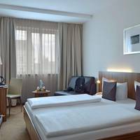 Family Room with Two Single Beds and Sofa Bed