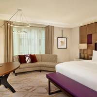 Corner Deluxe Room with King Bed and City View