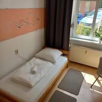 Single Room with Shared Shower and Toilet