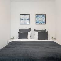 Two-Bedroom Apartment with Balcony and City View 