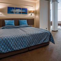 One-Bedroom Suite with Balcony and Sea View (2 Adults + 2 Children)