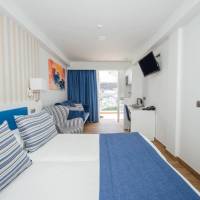 Superior Double Room Top Floor Balcony with Side Sea View