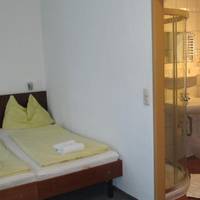 Quadruple Room with Private Bathroom