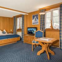 Family Room (2 adults + 2 children) with East Balcony 