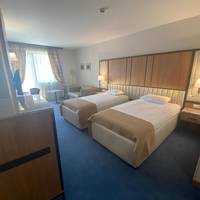 Twin Room (2 Adults + 1 Child)