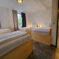 Quadruple Room with Private Bathroom