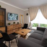 One-Bedroom Apartment with Balcony and Garden Access