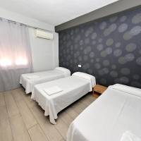 Double or Twin Room with Extra Bed and Shared Bathroom
