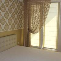 Deluxe One-Bedroom Apartment with Terrace and Sea View
