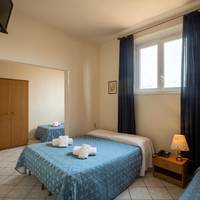 Quadruple Room with Shared Bathroom