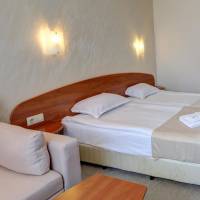 Twin Room with Balcony (2 Adults + 2 Children) 