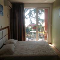Two-Bedroom Suite with Balcony and Sea View