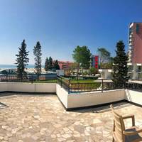 One-Bedroom Suite with Balcony and Sea View (2 Adults + 2 Children)