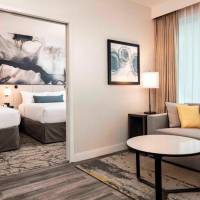 Deluxe Queen Suite with Two Queen Beds and Sofa Bed - City View