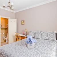 Queen Room with Shared Bathroom