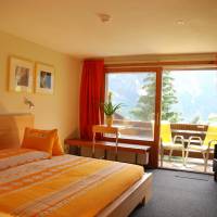 Triple Room with Balcony and Eiger View
