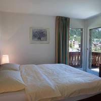 Family Suite (2 Adults + 2 Children) with balcony and mountain view