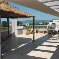 Two-Bedroom Penthouse Apartment with Terrace and Mountain View