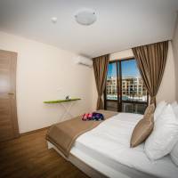 One-Bedroom Apartment with Side Sea View (2 Adults + 2 Children)