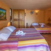 Double Queen Room with Partial Ocean View