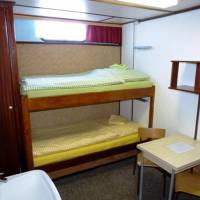 Single Bed in Dormitory Room