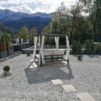 Spa nest with private sauna - panoramic view of the sunny side with terrace