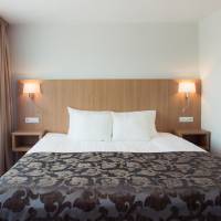 Family Suite (2 Adults + 2 Children) with Balcony and City View