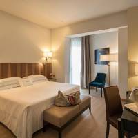 Superior Double Room with Partial Lake View and Small Balcony