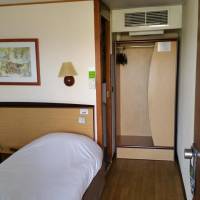 Twin Room with two single beds and one junior bed