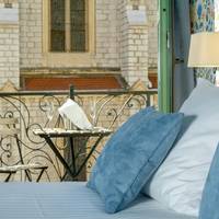 Junior Suite with Balcony and Notre Dame View