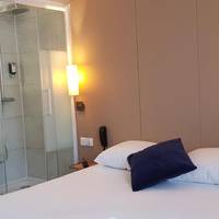 Small Double Room with Partially Open Bathroom - Non-Smoking